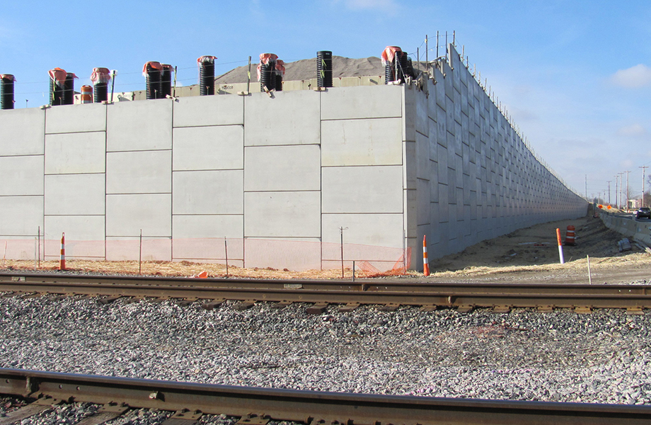 concrete panels used for wall near railroad